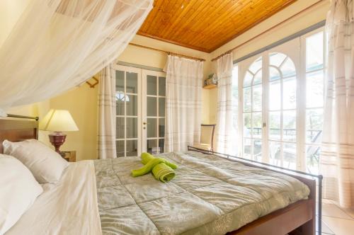 Postel nebo postele na pokoji v ubytování Rigos Apartments