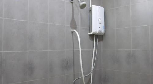 Koupelna v ubytování The Palm Village