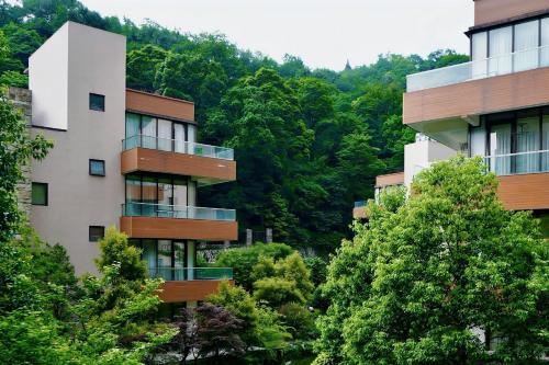 Gallery image of Dujiangyan Xinhua Haiyi Yulei Mountain Residence Hotel in Dujiangyan