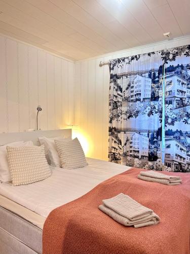 Ένα ή περισσότερα κρεβάτια σε δωμάτιο στο Cozy 4 bedroom house with sauna