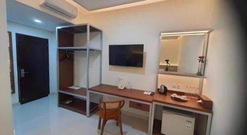 TV a/nebo společenská místnost v ubytování Kenari Asri Hotel