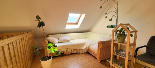 a small bedroom with a bed and a window at Landhaus auf der Alm in Langschlag