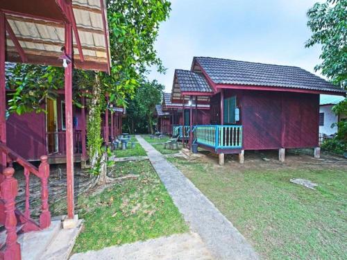 Fotografie z fotogalerie ubytování OYO 90620 Mahseer Chalet v destinaci Kuala Tahan