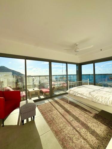 Ένα ή περισσότερα κρεβάτια σε δωμάτιο στο Alona's Apartments- sea&sunsets