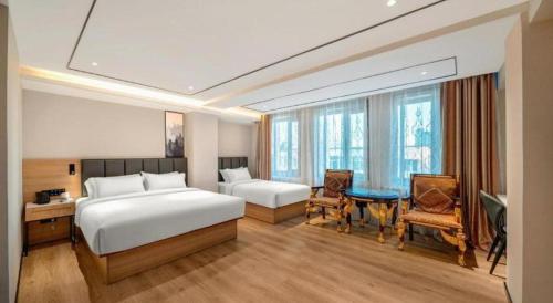 Ένα ή περισσότερα κρεβάτια σε δωμάτιο στο GreenTree Inn Harbin Central Avenue