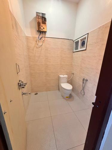 Koupelna v ubytování Rajkamal Hampi