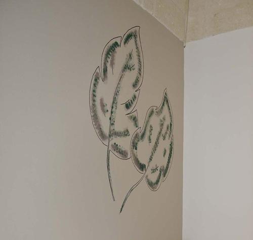 a drawing of a plant on a wall at Palazzo Kapece in Monopoli