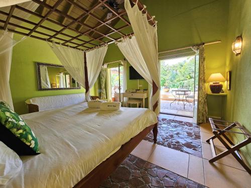 Postel nebo postele na pokoji v ubytování Villa African Queen - St Barth