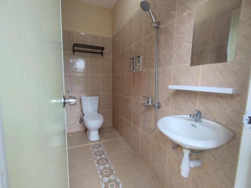 Koupelna v ubytování Arwana Inn