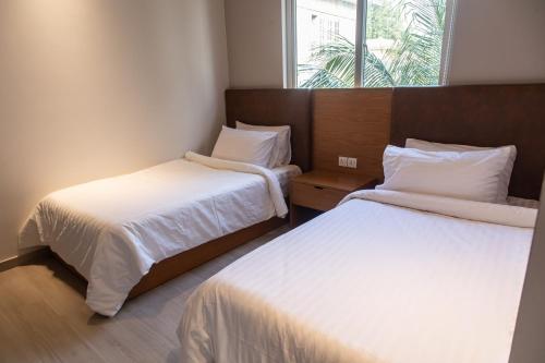 Postel nebo postele na pokoji v ubytování Central Residence by Paramount Hospitality