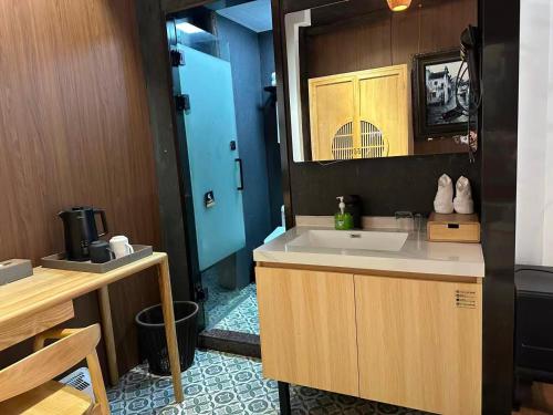 Kuchyň nebo kuchyňský kout v ubytování Tonglu Hemingge Homestay