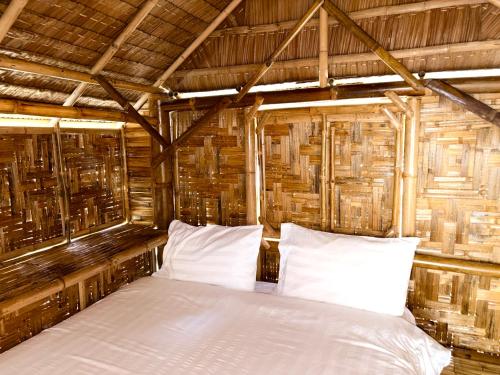 Postel nebo postele na pokoji v ubytování Patong Canal House