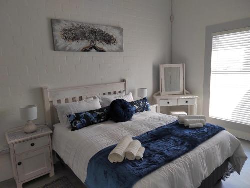 Postel nebo postele na pokoji v ubytování Khumbaya Self Catering