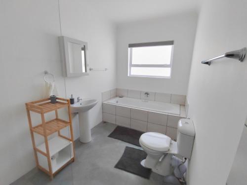 Koupelna v ubytování Khumbaya Self Catering