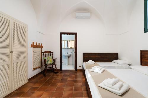 Postel nebo postele na pokoji v ubytování Villa S Venardia Gallipoli