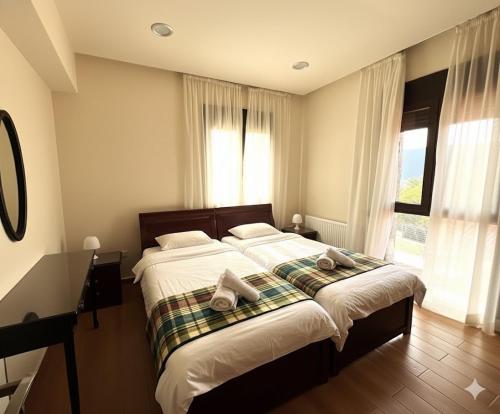 Ένα ή περισσότερα κρεβάτια σε δωμάτιο στο VILLa ERASMIA