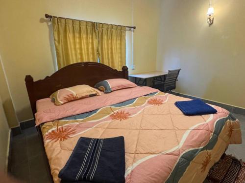 Ένα ή περισσότερα κρεβάτια σε δωμάτιο στο Kim Hong Guesthouse