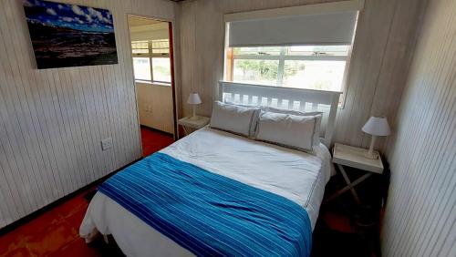 Postel nebo postele na pokoji v ubytování Sea Cabin