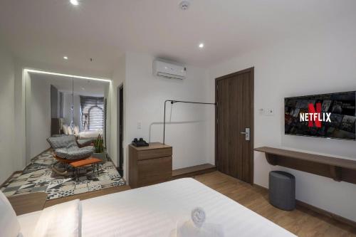 TV a/nebo společenská místnost v ubytování La Hotel Duong So 21