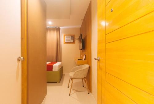 Fotografie z fotogalerie ubytování RedDoorz @ Benelio Suites Pavia Iloilo v destinaci Pavia