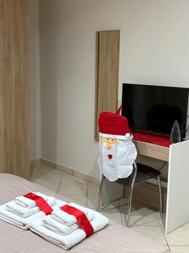 TV a/nebo společenská místnost v ubytování Aqua Pompeiana