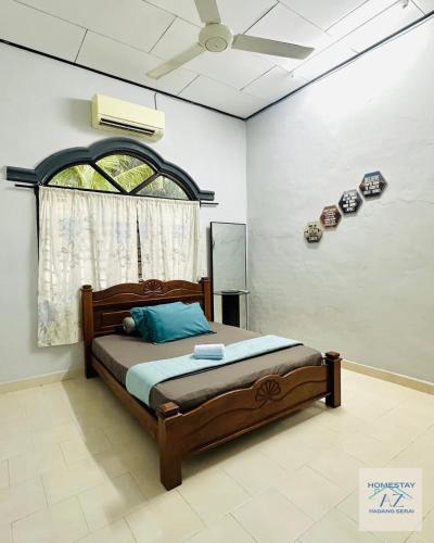 Postel nebo postele na pokoji v ubytování Homestay AZ Padang Serai