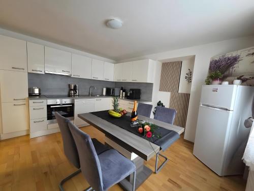 Kuchyň nebo kuchyňský kout v ubytování Haus Jassy