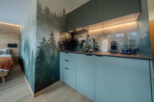 Una cocina o cocineta en Collina Comfort Design-Studio by Arosa Vacations