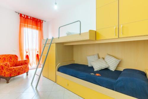 En eller flere senge i et værelse på Appartamento Zara 3 - MyHo Casa