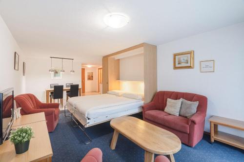 Una cama o camas en una habitación de Bolero Appartements