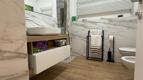 Koupelna v ubytování Appartamento moderno a Borgo Valsugana