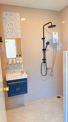 a bathroom with a shower and a sink at sleep private khaoya unit03 in Mu Si