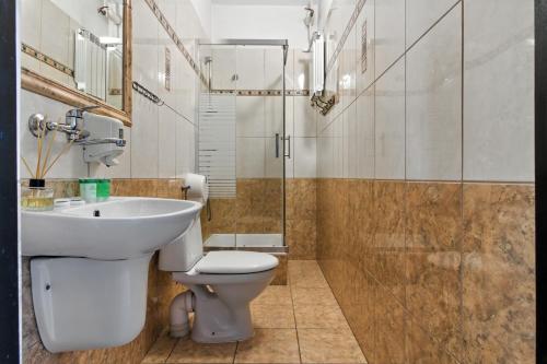 Ванна кімната в Dwór Rychwałd