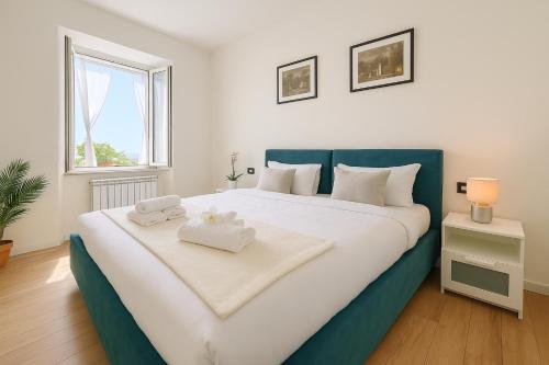 Ένα ή περισσότερα κρεβάτια σε δωμάτιο στο Como Lake View Enjoy&Relax