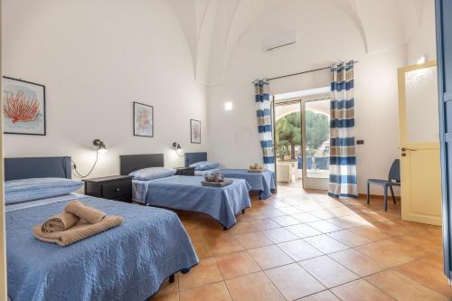 Ένα ή περισσότερα κρεβάτια σε δωμάτιο στο Villa degli Archi