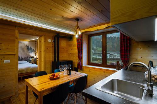 Kuchyň nebo kuchyňský kout v ubytování Dolomiti Urban Lodge