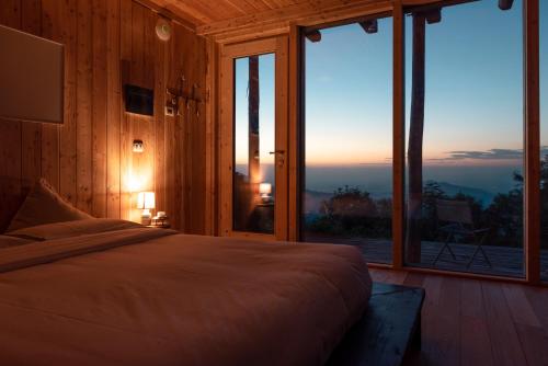 Ένα ή περισσότερα κρεβάτια σε δωμάτιο στο Borgata Paraloup