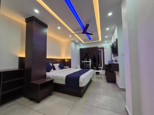 Postel nebo postele na pokoji v ubytování G Mount Budget Stay