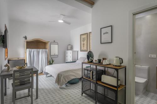 Una cama o camas en una habitación de Studio Tagoro