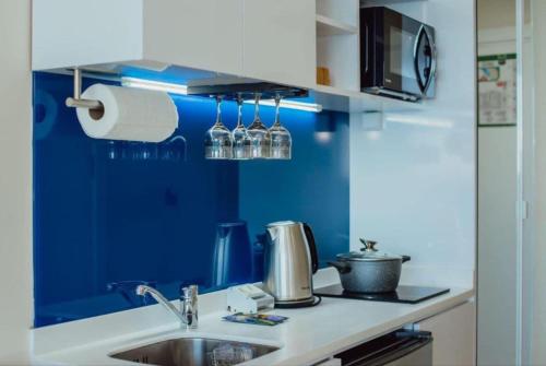 Η κουζίνα ή μικρή κουζίνα στο ORBI CITY - High Class Apartments