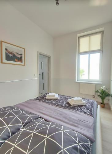 Ένα ή περισσότερα κρεβάτια σε δωμάτιο στο Silver Stone by Grafit