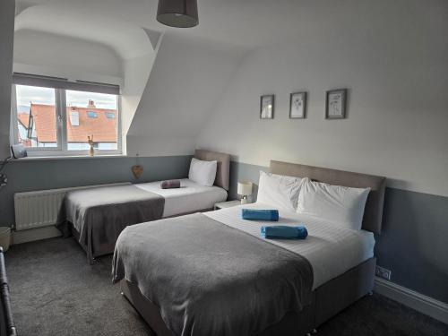 Ένα ή περισσότερα κρεβάτια σε δωμάτιο στο Catch of the Day