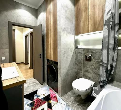 Ένα μπάνιο στο Urban apartment for 6 person in 4YOU Residence