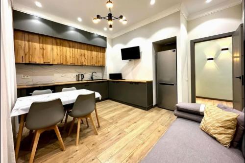 Η κουζίνα ή μικρή κουζίνα στο Urban apartment for 6 person in 4YOU Residence