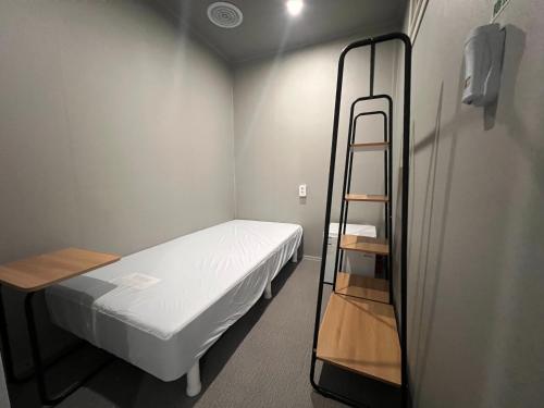 Ένα ή περισσότερα κρεβάτια σε δωμάτιο στο 엔젤이레미니스튜디오