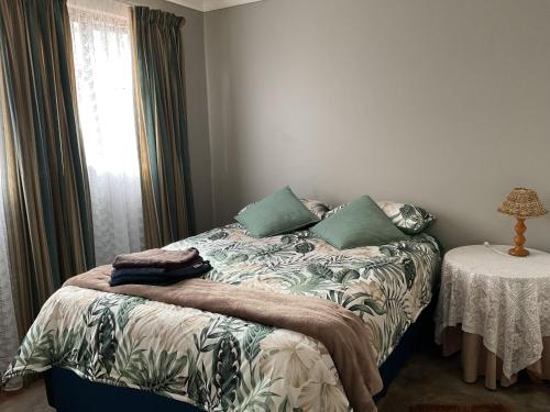 Una cama o camas en una habitación de Home away from home