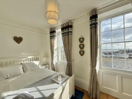 En eller flere senge i et værelse på 1 Cobb House