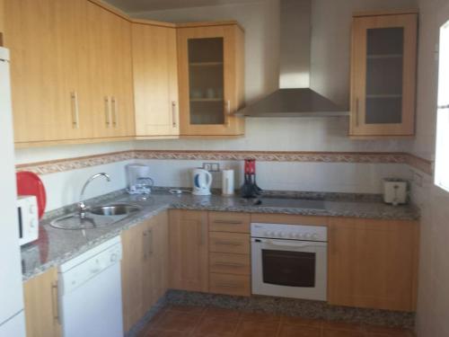 Køkken eller tekøkken på Casa María Ronda con parking