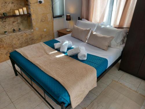 Giường trong phòng chung tại Old town - Fortezza Nest