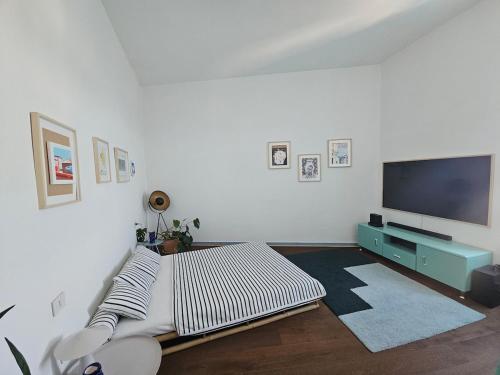 Postel nebo postele na pokoji v ubytování The Blue terrace